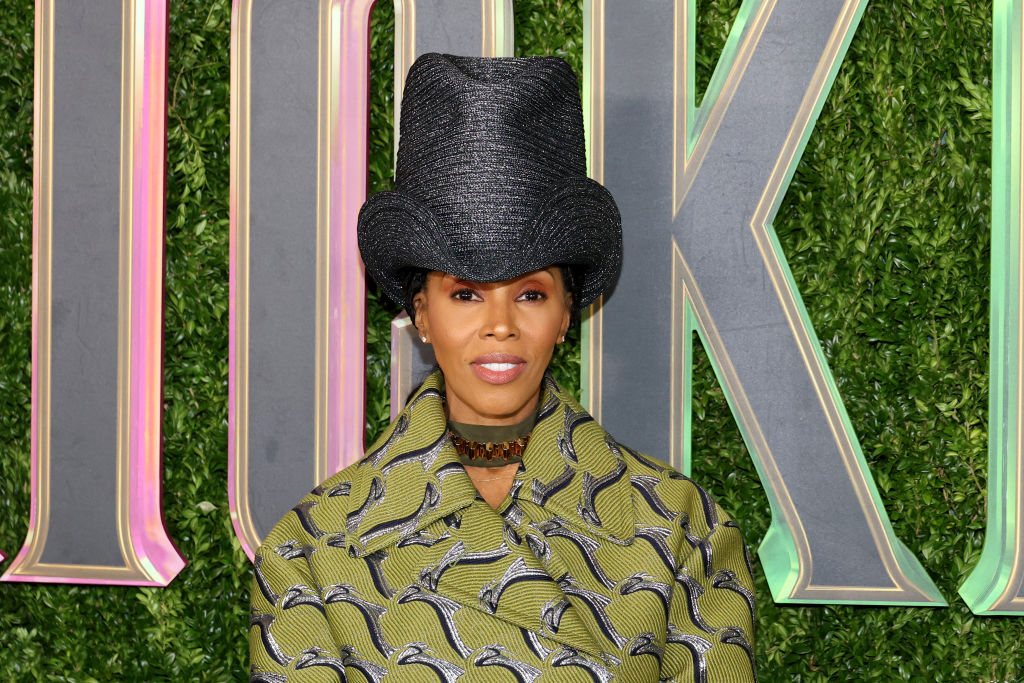 June Ambrose Shuts Down The Gold Party In A Tom Ford Suit
