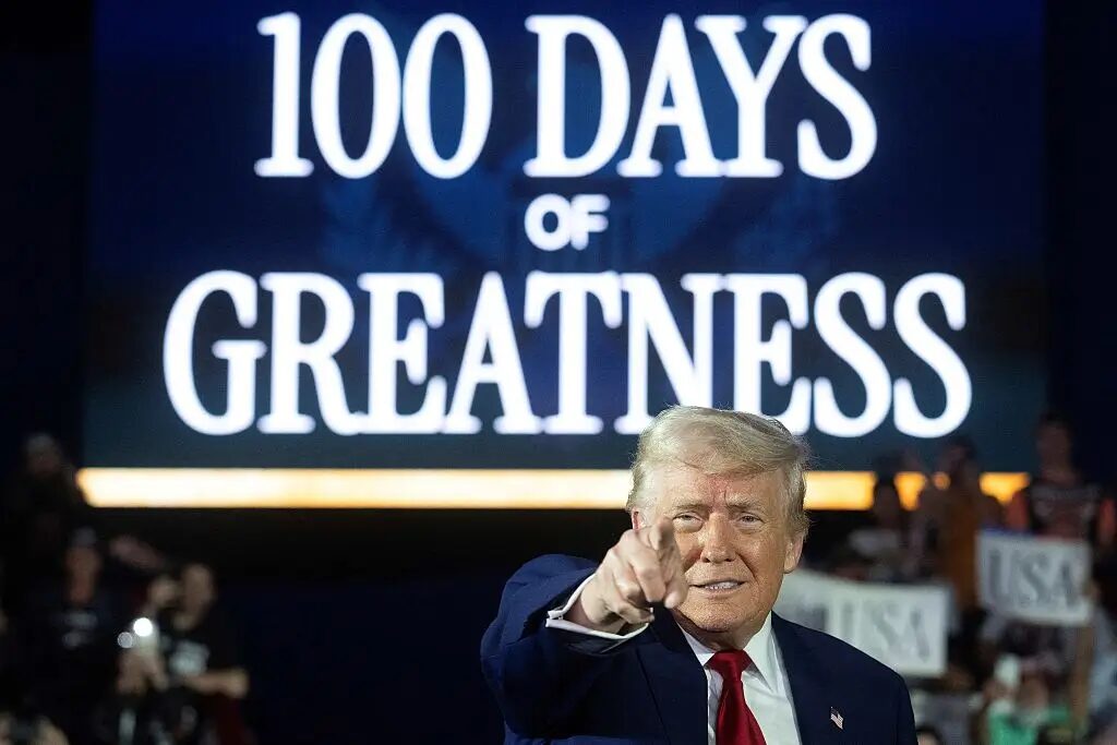 ‘There’s My Friend!’: Donald Trump Points Out Black Man In Awkward Moment At 100-Day Rally, Claims He’s Not Paying Him a ‘Fortune’ for Support, Skeptics Abound