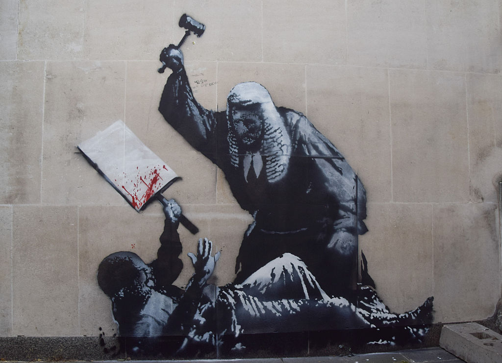 Banksy’s Best Street Art: 10 Powerful Murals That Define The Elusive Artist’s Legacy