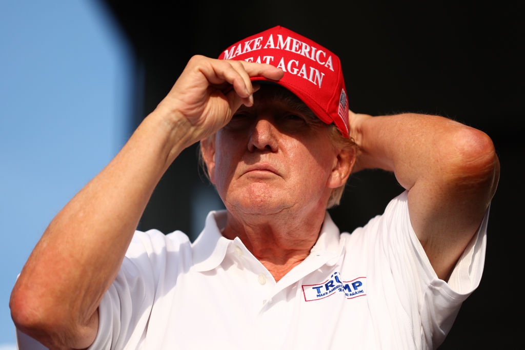 ‘He Might Forget’: Trump’s Golf Outing Has Fans Zooming In on His Body — and the Bold Lettering Across His Chest Has Everyone in Stitches