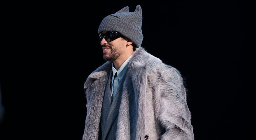 Bad Bunny Isn’t Waiting Until The Super Bowl To Show Off His Swag, Rocks Cartier & Bottega Veneta During A Press Stop